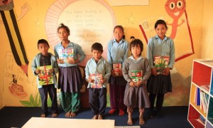 Khumveshwori Star Readers with their prizes posing for a group photo.