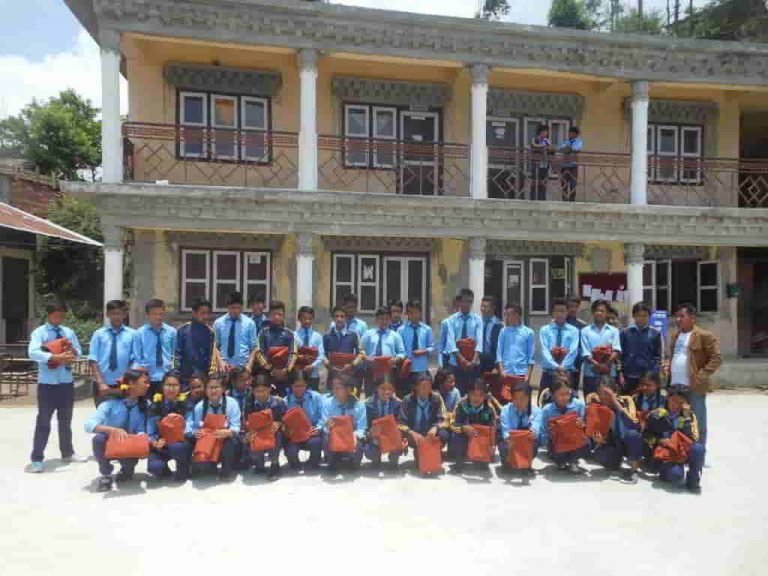 Chilaune school students with ponchos 4177 feat image