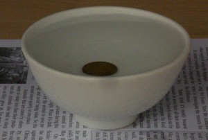 coin in the bowl - with water 2